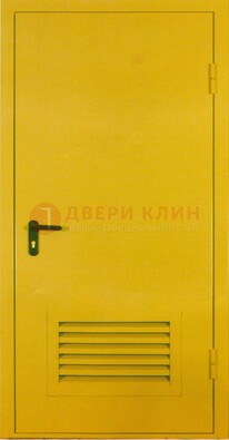 Желтая металлическая противопожарная дверь с вентиляционной решеткой ДТ-15 в Омске